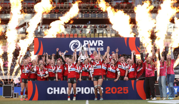 BARNET, ENGLAND - MARCH 16: Natasha 'Mo' Hunt and Zoe Aldcroft of Gloucester-Hartpury lift the Premiership Women's Rugby Trophy after their team's victory in the Premiership Women's Rugby Final match between Gloucester-Hartpury and Saracens at StoneX Stadium on March 16, 2025 in Barnet, England. (Photo by Ryan Hiscott/Getty Images)