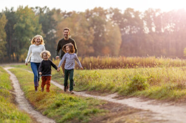 Family walking through fields