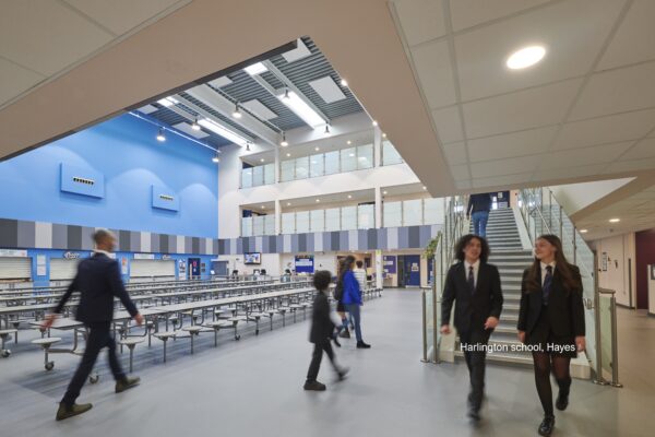 Pupils walking through the canteen area of Harlington School