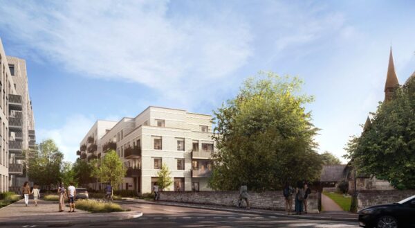 A block of flats on Waterloo and Queen Street in London with trees at the side