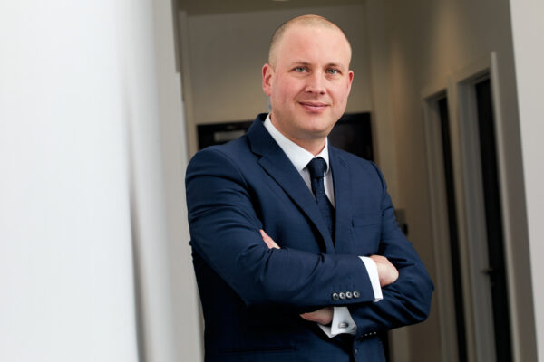 David Wingfield headshot with arms crossed