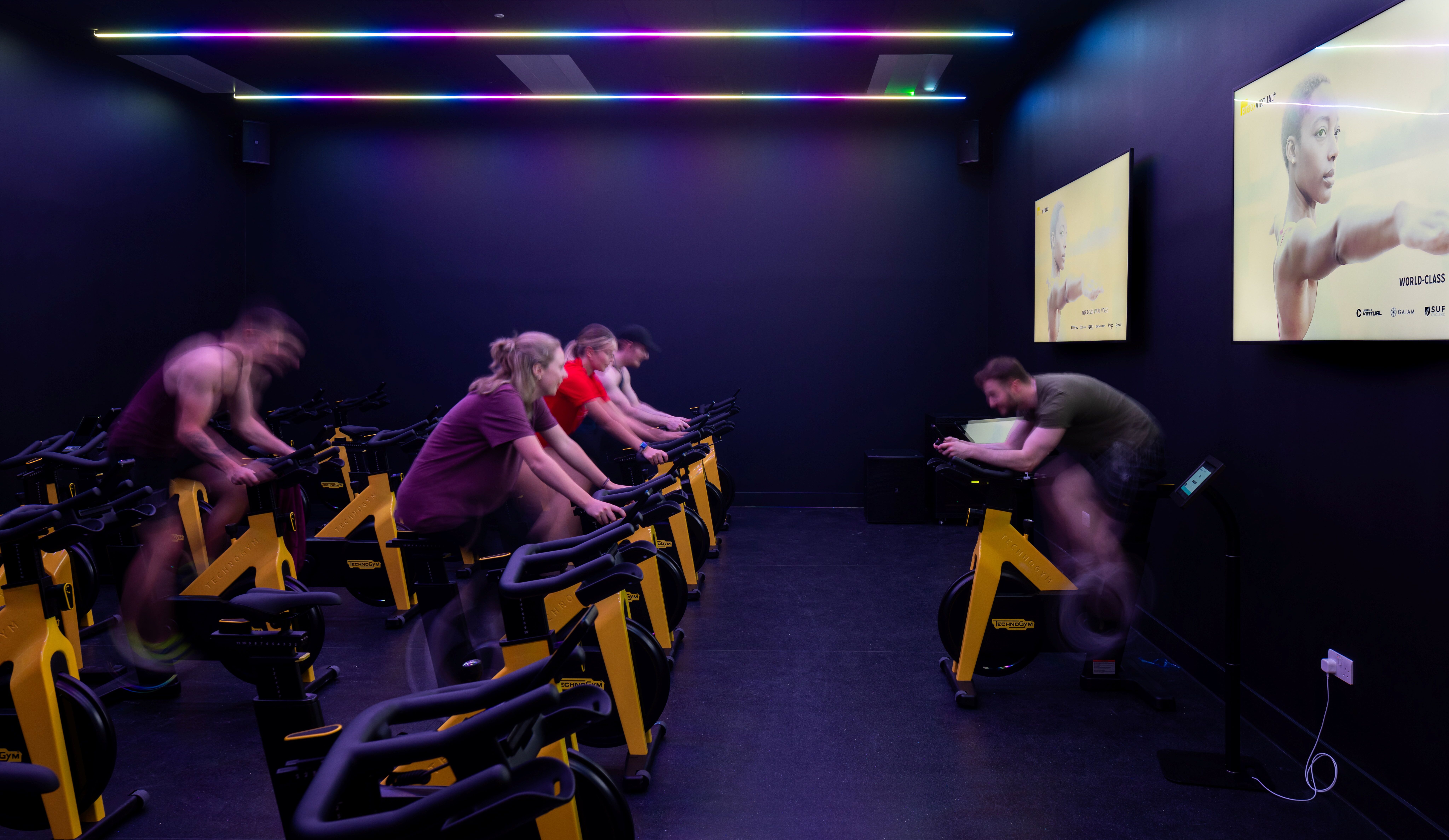 Jubilee Sports Centre - University of Southampton, users in a spin studio on the bikes doing a workout