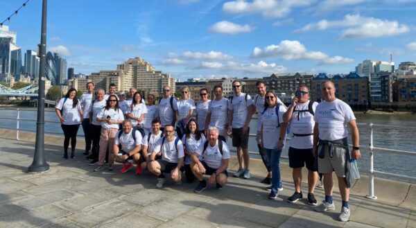 Wates team posing by the river Thames for Papyrus